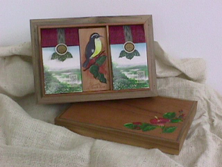 small wooden box with art piece
